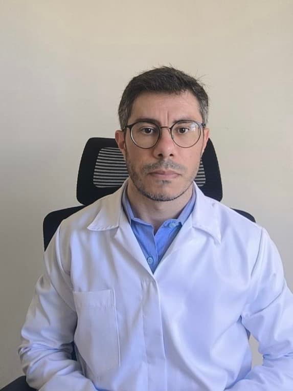 Dr. André Luiz Vieira Lockmann — CRM 52899/MG · Neurologista